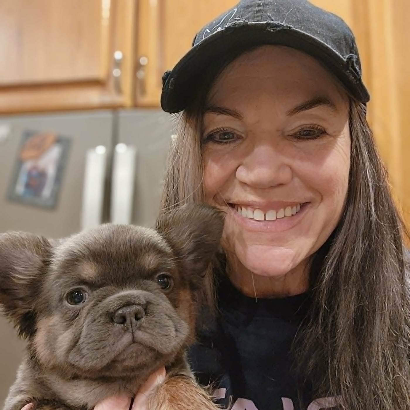 Paula Busch of Forever Frenchies with a French Bulldog